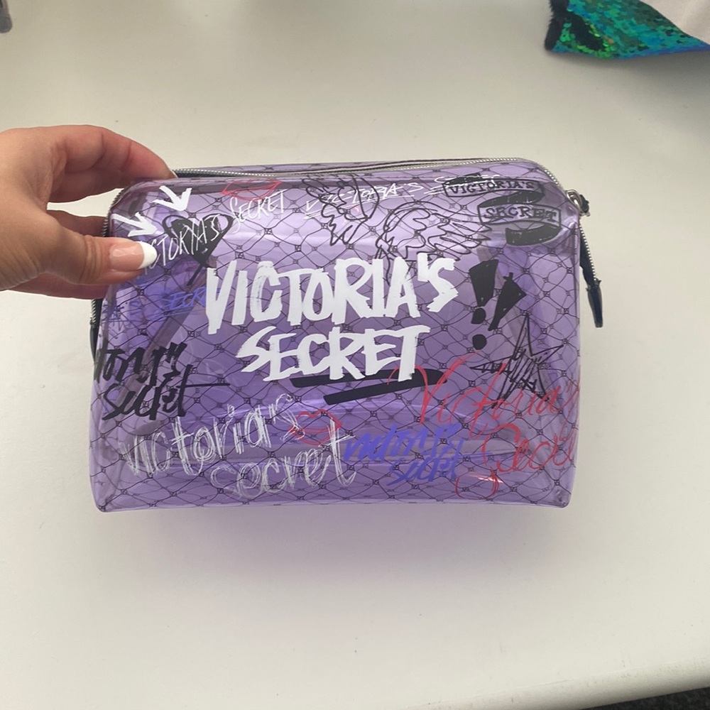 Purple plastic victorious secret makeup bag